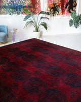 Antique Turkmen rug in a living room setting, pile rug, Turkish rug, vintage rug, portland, rug shop, bright colors, wild shaman, soft rug, bold color, Portland, Oregon, rug store, rug shop, local shop, antique rug