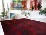 Antique Turkmen rug in a living room setting, pile rug, Turkish rug, vintage rug, portland, rug shop, bright colors, wild shaman, soft rug, bold color, Portland, Oregon, rug store, rug shop, local shop, antique rug
