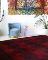 Antique Turkmen rug in a living room setting, pile rug, Turkish rug, vintage rug, portland, rug shop, bright colors, wild shaman, soft rug, bold color, Portland, Oregon, rug store, rug shop, local shop, antique rug