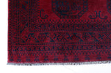 Antique Turkmen rug in a living room setting, pile rug, Turkish rug, vintage rug, portland, rug shop, bright colors, wild shaman, soft rug, bold color, Portland, Oregon, rug store, rug shop, local shop, antique rug