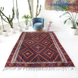 Vintage kilim rug in living room setting, bright colors, wild shaman, soft rug, bold color, Portland, Oregon, rug store, rug shop, local shop, vintage rug, modern kilim, warm colors, antique kilim rug