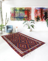 Vintage kilim rug in living room setting, bright colors, wild shaman, soft rug, bold color, Portland, Oregon, rug store, rug shop, local shop, vintage rug, modern kilim, warm colors, antique kilim rug