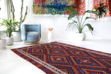Vintage kilim rug in living room setting, bright colors, wild shaman, soft rug, bold color, Portland, Oregon, rug store, rug shop, local shop, vintage rug, modern kilim, warm colors, antique kilim rug