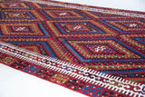 Vintage kilim rug in living room setting, bright colors, wild shaman, soft rug, bold color, Portland, Oregon, rug store, rug shop, local shop, vintage rug, modern kilim, warm colors, antique kilim rug
