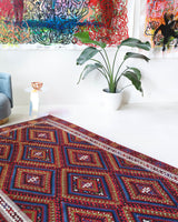 Vintage kilim rug in living room setting, bright colors, wild shaman, soft rug, bold color, Portland, Oregon, rug store, rug shop, local shop, vintage rug, modern kilim, warm colors, antique kilim rug