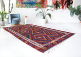 Vintage kilim rug in living room setting, bright colors, wild shaman, soft rug, bold color, Portland, Oregon, rug store, rug shop, local shop, vintage rug, modern kilim, warm colors, antique kilim rug