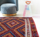 Vintage kilim rug in living room setting, bright colors, wild shaman, soft rug, bold color, Portland, Oregon, rug store, rug shop, local shop, vintage rug, modern kilim, warm colors, antique kilim rug