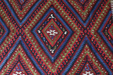 Vintage kilim rug in living room setting, bright colors, wild shaman, soft rug, bold color, Portland, Oregon, rug store, rug shop, local shop, vintage rug, modern kilim, warm colors, antique kilim rug