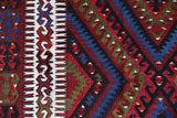 Vintage kilim rug in living room setting, bright colors, wild shaman, soft rug, bold color, Portland, Oregon, rug store, rug shop, local shop, vintage rug, modern kilim, warm colors, antique kilim rug