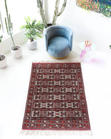 Vintage kilim rug in living room setting, bright colors, wild shaman, soft rug, bold color, Portland, Oregon, rug store, rug shop, local shop, vintage rug, modern kilim, warm colors, antique kilim rug