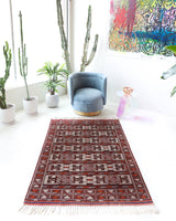 Vintage kilim rug in living room setting, bright colors, wild shaman, soft rug, bold color, Portland, Oregon, rug store, rug shop, local shop, vintage rug, modern kilim, warm colors, antique kilim rug