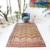 Vintage kilim rug in room decor setting, old rug, antique rug, pastel colors, faded colors, Turkish rug, vintage rug, soft rug, Portland, Oregon, rug store, rug shop, local shop,  antique kilim rug, bold colors, bright colors, faded colors