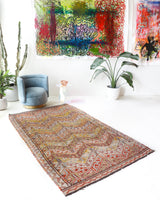 Vintage kilim rug in room decor setting, old rug, antique rug, pastel colors, faded colors, Turkish rug, vintage rug, soft rug, Portland, Oregon, rug store, rug shop, local shop,  antique kilim rug, bold colors, bright colors, faded colors