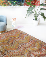 Vintage kilim rug in room decor setting, old rug, antique rug, pastel colors, faded colors, Turkish rug, vintage rug, soft rug, Portland, Oregon, rug store, rug shop, local shop,  antique kilim rug, bold colors, bright colors, faded colors