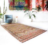 Vintage kilim rug in room decor setting, old rug, antique rug, pastel colors, faded colors, Turkish rug, vintage rug, soft rug, Portland, Oregon, rug store, rug shop, local shop,  antique kilim rug, bold colors, bright colors, faded colors