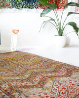 Vintage kilim rug in room decor setting, old rug, antique rug, pastel colors, faded colors, Turkish rug, vintage rug, soft rug, Portland, Oregon, rug store, rug shop, local shop,  antique kilim rug, bold colors, bright colors, faded colors