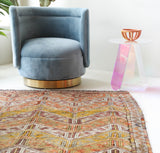 Vintage kilim rug in room decor setting, old rug, antique rug, pastel colors, faded colors, Turkish rug, vintage rug, soft rug, Portland, Oregon, rug store, rug shop, local shop,  antique kilim rug, bold colors, bright colors, faded colors