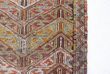 Vintage kilim rug in room decor setting, old rug, antique rug, pastel colors, faded colors, Turkish rug, vintage rug, soft rug, Portland, Oregon, rug store, rug shop, local shop,  antique kilim rug, bold colors, bright colors, faded colors