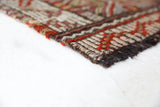Vintage kilim rug in room decor setting, old rug, antique rug, pastel colors, faded colors, Turkish rug, vintage rug, soft rug, Portland, Oregon, rug store, rug shop, local shop,  antique kilim rug, bold colors, bright colors, faded colors