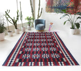 Vintage kilim rug in living room setting, bright colors, wild shaman, soft rug, bold color, Portland, Oregon, rug store, rug shop, local shop, vintage rug, modern kilim, warm colors, antique kilim rug