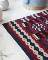 Vintage kilim rug in living room setting, bright colors, wild shaman, soft rug, bold color, Portland, Oregon, rug store, rug shop, local shop, vintage rug, modern kilim, warm colors, antique kilim rug