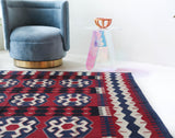 Vintage kilim rug in living room setting, bright colors, wild shaman, soft rug, bold color, Portland, Oregon, rug store, rug shop, local shop, vintage rug, modern kilim, warm colors, antique kilim rug