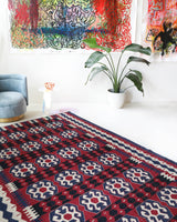 Vintage kilim rug in living room setting, bright colors, wild shaman, soft rug, bold color, Portland, Oregon, rug store, rug shop, local shop, vintage rug, modern kilim, warm colors, antique kilim rug