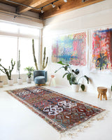 Vintage kilim rug in living room setting, old rug, antique rug, pastel colors, faded colors, Turkish rug, vintage rug, soft rug, Portland, Oregon, rug store, rug shop, local shop, earthy tones, earthy colors, warm colors