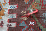 Vintage kilim rug in living room setting, old rug, antique rug, pastel colors, faded colors, Turkish rug, vintage rug, soft rug, Portland, Oregon, rug store, rug shop, local shop, earthy tones, earthy colors, warm colors