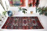 Vintage kilim rug in living room setting, old rug, antique rug, pastel colors, faded colors, Turkish rug, vintage rug, soft rug, Portland, Oregon, rug store, rug shop, local shop, earthy tones, earthy colors, warm colors