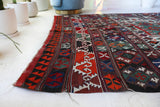 Vintage kilim rug in living room setting, old rug, antique rug, pastel colors, faded colors, Turkish rug, vintage rug, soft rug, Portland, Oregon, rug store, rug shop, local shop, earthy tones, earthy colors, warm colors