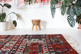 Vintage kilim rug in living room setting, old rug, antique rug, pastel colors, faded colors, Turkish rug, vintage rug, soft rug, Portland, Oregon, rug store, rug shop, local shop, earthy tones, earthy colors, warm colors
