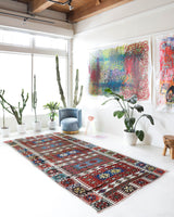 Vintage kilim rug in living room setting, bright colors, wild shaman, soft rug, bold color, Portland, Oregon, rug store, rug shop, local shop, vintage rug, modern kilim, warm colors, antique rug, antique kilim
