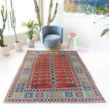 Vintage Turkish rug in a living room setting, pile rug, Turkish rug, vintage rug, portland, rug shop, bright colors, wild shaman, soft rug, bold color, Portland, Oregon, rug store, rug shop, local shop, antique rug