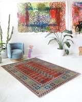 Vintage Turkish rug in a living room setting, pile rug, Turkish rug, vintage rug, portland, rug shop, bright colors, wild shaman, soft rug, bold color, Portland, Oregon, rug store, rug shop, local shop, antique rug