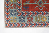 Vintage Turkish rug in a living room setting, pile rug, Turkish rug, vintage rug, portland, rug shop, bright colors, wild shaman, soft rug, bold color, Portland, Oregon, rug store, rug shop, local shop, antique rug