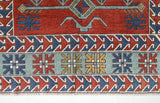 Vintage Turkish rug in a living room setting, pile rug, Turkish rug, vintage rug, portland, rug shop, bright colors, wild shaman, soft rug, bold color, Portland, Oregon, rug store, rug shop, local shop, antique rug