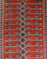 Vintage Turkish rug in a living room setting, pile rug, Turkish rug, vintage rug, portland, rug shop, bright colors, wild shaman, soft rug, bold color, Portland, Oregon, rug store, rug shop, local shop, antique rug