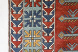 Vintage Turkish rug in a living room setting, pile rug, Turkish rug, vintage rug, portland, rug shop, bright colors, wild shaman, soft rug, bold color, Portland, Oregon, rug store, rug shop, local shop, antique rug
