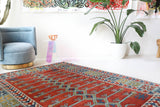Vintage Turkish rug in a living room setting, pile rug, Turkish rug, vintage rug, portland, rug shop, bright colors, wild shaman, soft rug, bold color, Portland, Oregon, rug store, rug shop, local shop, antique rug