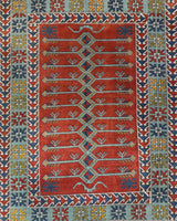 Vintage Turkish rug in a living room setting, pile rug, Turkish rug, vintage rug, portland, rug shop, bright colors, wild shaman, soft rug, bold color, Portland, Oregon, rug store, rug shop, local shop, antique rug