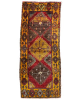 Vintage Turkish runner rug in a living room setting, pile rug, Turkish rug, vintage rug, portland, rug shop, bright colors, wild shaman, soft rug, bold color, Portland, Oregon, rug store, rug shop, local shop, antique rug