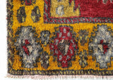 Vintage Turkish runner rug in a living room setting, pile rug, Turkish rug, vintage rug, portland, rug shop, bright colors, wild shaman, soft rug, bold color, Portland, Oregon, rug store, rug shop, local shop, antique rug