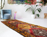 Vintage Turkish runner rug in a living room setting, pile rug, Turkish rug, vintage rug, portland, rug shop, bright colors, wild shaman, soft rug, bold color, Portland, Oregon, rug store, rug shop, local shop, antique rug