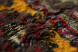 Vintage Turkish runner rug in a living room setting, pile rug, Turkish rug, vintage rug, portland, rug shop, bright colors, wild shaman, soft rug, bold color, Portland, Oregon, rug store, rug shop, local shop, antique rug