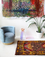 Vintage Turkish runner rug in a living room setting, pile rug, Turkish rug, vintage rug, portland, rug shop, bright colors, wild shaman, soft rug, bold color, Portland, Oregon, rug store, rug shop, local shop, antique rug