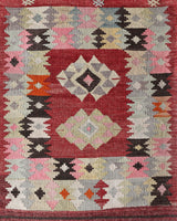 Vintage kilim rug in living room setting, bright colors, wild shaman, soft rug, bold color, Portland, Oregon, rug store, rug shop, local shop, vintage rug, modern kilim, warm colors, antique rug, antique kilim