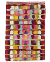 Vintage kilim rug in room decor setting, old rug, antique rug, pastel colors, faded colors, Turkish rug, vintage rug, soft rug, Portland, Oregon, rug store, rug shop, local shop,  antique kilim rug, bold colors, bright colors, faded colors