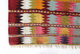 Vintage kilim rug in room decor setting, old rug, antique rug, pastel colors, faded colors, Turkish rug, vintage rug, soft rug, Portland, Oregon, rug store, rug shop, local shop,  antique kilim rug, bold colors, bright colors, faded colors