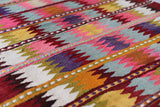 Vintage kilim rug in room decor setting, old rug, antique rug, pastel colors, faded colors, Turkish rug, vintage rug, soft rug, Portland, Oregon, rug store, rug shop, local shop,  antique kilim rug, bold colors, bright colors, faded colors
